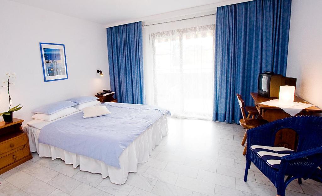 Hotel Elvetico Locarno Pokoj fotografie